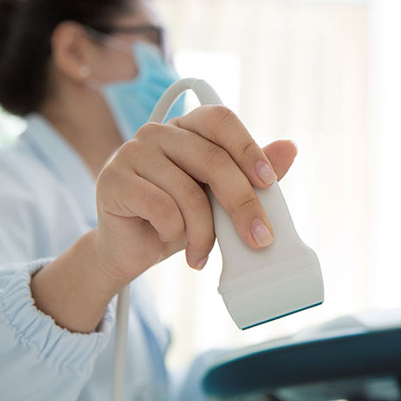 doctor with ultrasound wand